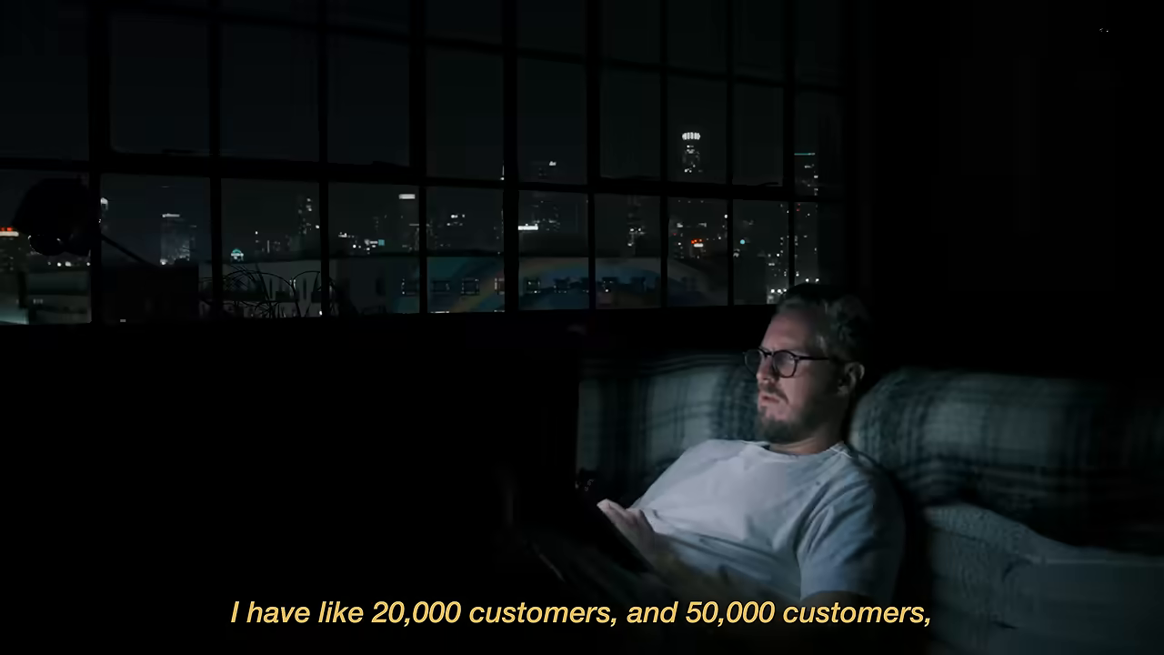"I have like 20,000 customers, and 50,000 customers" 자막 — 이 숫자까지 가면 파산한다는 계산이 화면에 뜬 순간